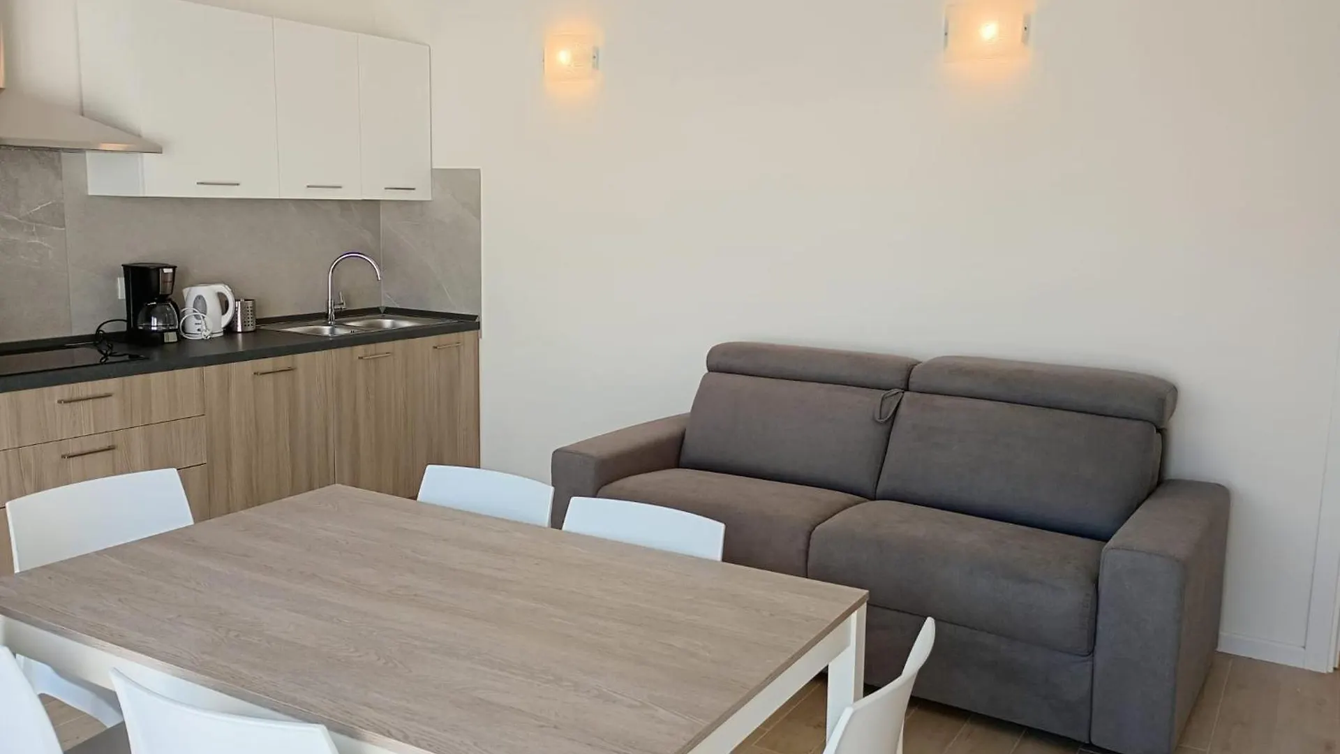 Residence Florinas Con Piscina - Family Apartments לידו די ג'סולו 0*,  איטליה